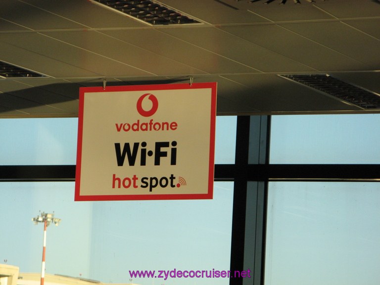 003: Lots of WiFi spots in the Milan airport - not free, though